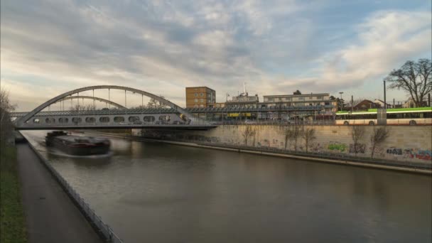 Hannover, Germany - December 29, 2017: transfer stop of public transport and the German Midland Canal in Hanover. 4K Time lapse. — Stock Video