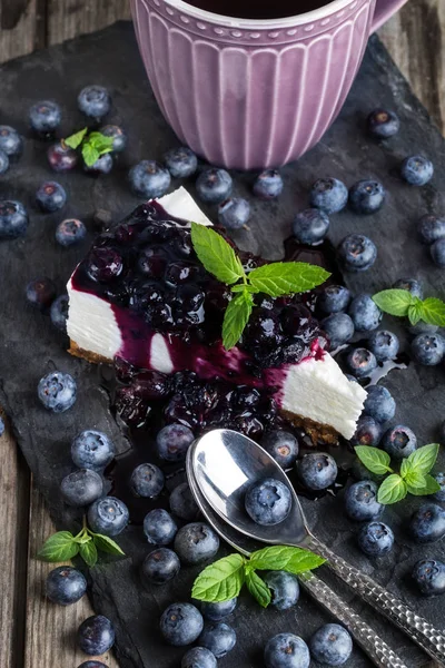 Piece of blueberry cheesecake — Stock Photo, Image