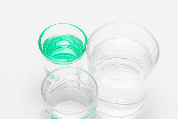 Transparent glasses with water in the studio