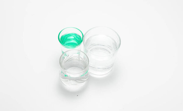 Transparent glasses with water in the studio