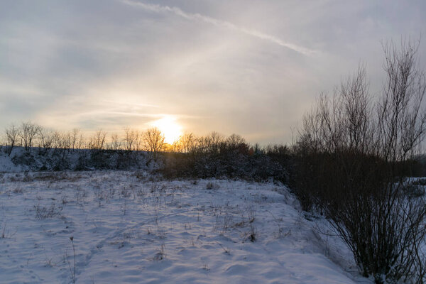 snow covered ground in evening at winter season 