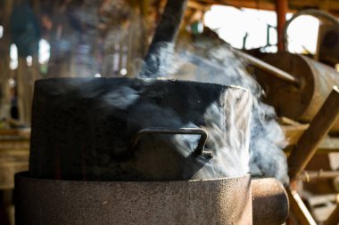 iron boiler with marc of grapes