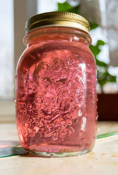 Glass Jar Pink Liquid Close View — Stock Photo, Image