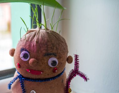 snowman ornament with wheat in her hair