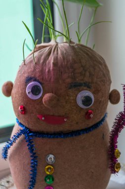 snowman ornament with wheat in her hair