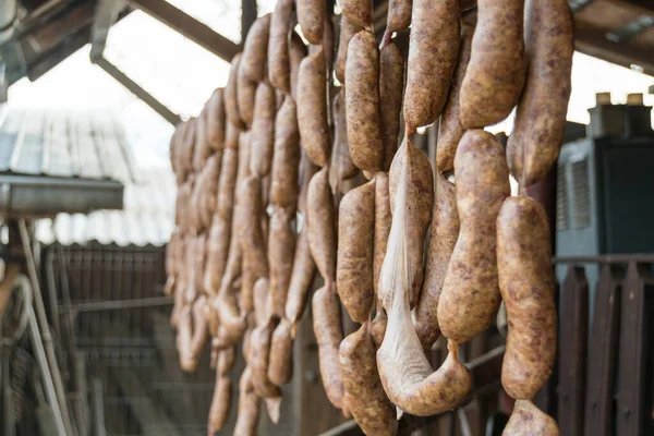 Grilled Pork Sausages Hanging — Stock Photo, Image