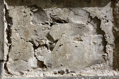 Doku yapısı. Beton duvar. Hasarlı tuğla duvar.