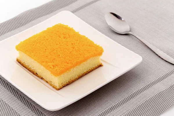 Golden egg strips topping on butter cake or Foi Thong cake on pl