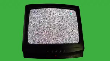 Yeşil arka planda eski bir televizyon, retro TV 'de kanal değiştirmek. Kötü televizyon sinyali, parazit ve yatay çizgilerin hareketi. Siyah ve beyaz gürültü ekranı, eski TV 'nin tahıl etkisi