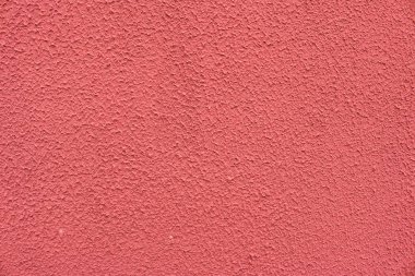 Binanın ön cephesinde pembe dekoratif alçı var.