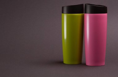 two multi-colored thermal bottles of shaker for sports nutrition