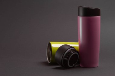 two multi-colored thermal bottles of shaker for sports nutrition