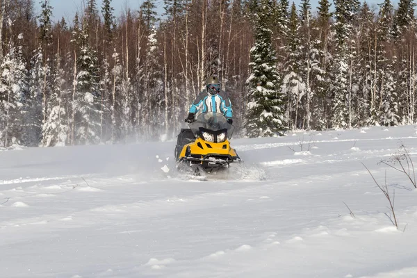 Athlete on a snowmobile. — Stock Photo, Image