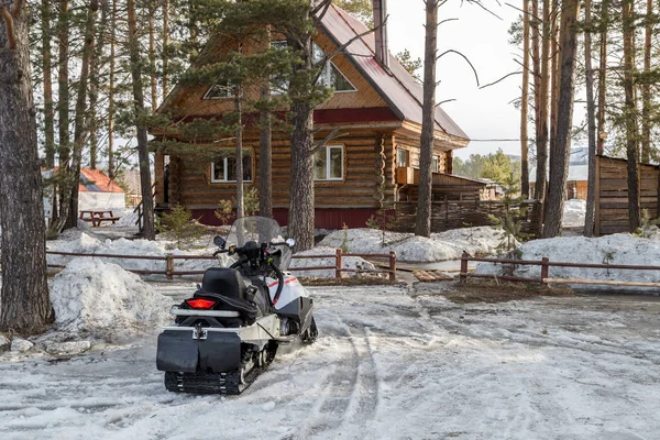 Snowmobile at home — Stock Photo, Image