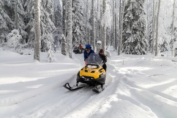 Athletes on a snowmobile. — Stock Photo, Image
