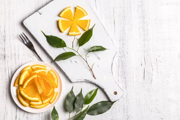 Bloem Van Sinaasappelschijfjes Een Houten Plank — Stockfoto