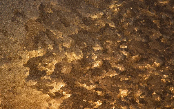 Olağandışı Frost'un üzerinde bir pencere gün batımında