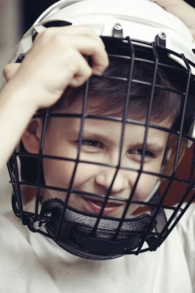 Little boy in the hockey helm. Emotions of child. — Stock Photo, Image