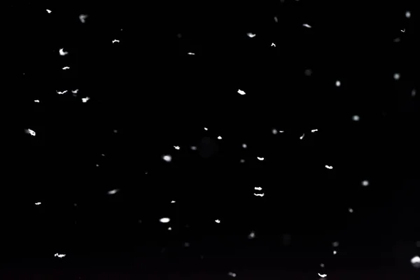 Ночью Выпадает Снег Огни Боке Черном Фоне Летающие Снежинки Воздухе — стоковое фото