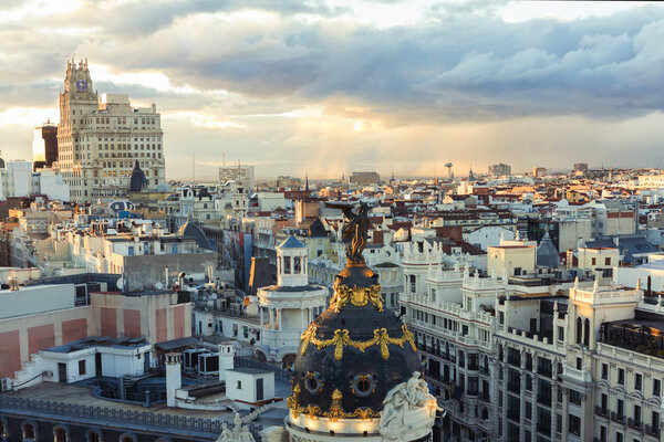 Panoramic aerial view of Gran Via and Plaza de Cibeles in the Madrid town in a storm