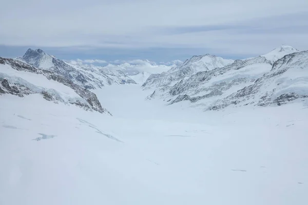 View from the jungfrau mountain summit towards the Aletsch glacier. Bernese Oberland, Switzerland. Swiss Alps