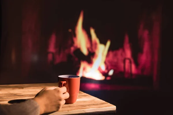 Woman Winter Sweater Relaxes Sitting Christmas Fireplace Cup Hot Drink — 스톡 사진