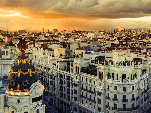 Panoramic aerial view of Gran Via and Plaza de Cibeles in the Madrid town in a storm