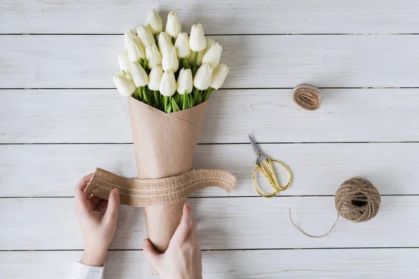 Woman Florist Wrapping Beautiful Bouquet White Tulips Pack Craft Paper — 스톡 사진