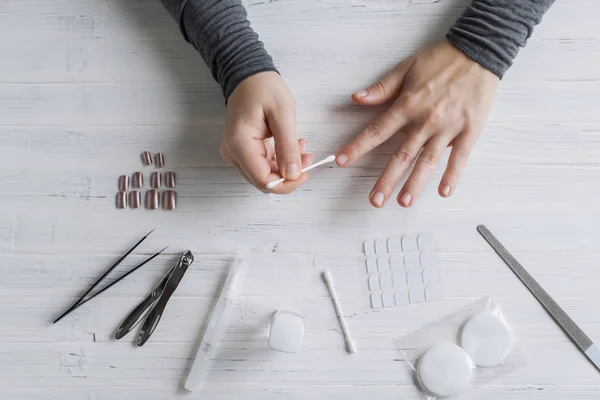 Process Putting Artificial Fake Fingernail Finger Woman Manicure Flat Lay — 스톡 사진