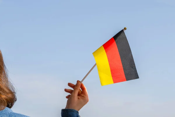Woman Hand Germany Swaying Flag Blue Sky Concept — Stock Photo, Image