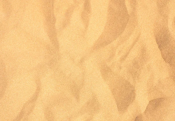 夕日のビーチで黄色の砂の背景 — ストック写真