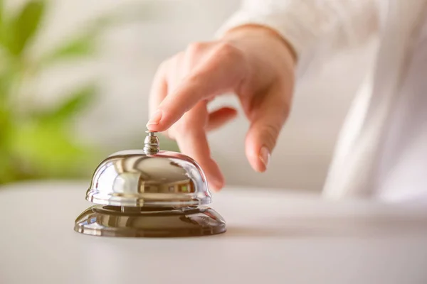 Hand Guest Ringing Silver Bell Reception Desk Copy Space Hotel — Stock Photo, Image