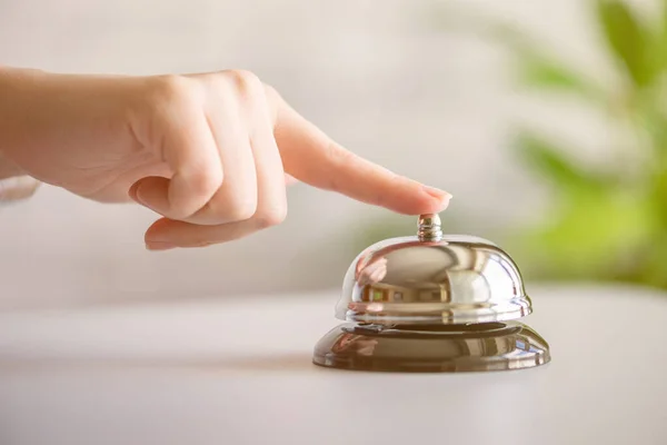Hand Guest Ringing Silver Bell Reception Desk Copy Space Hotel — Stock Photo, Image