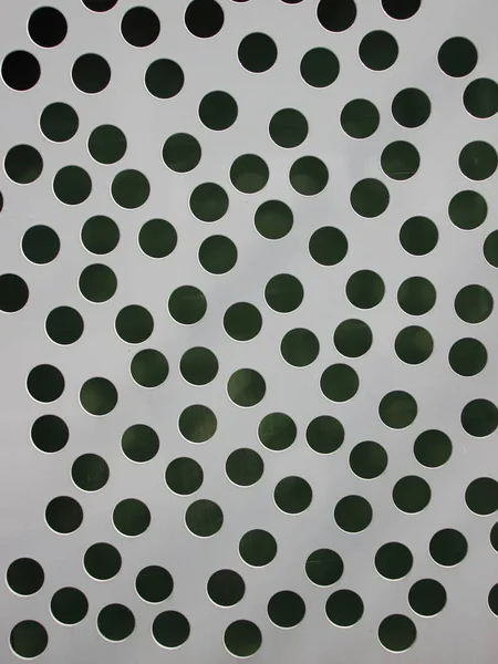 Grey Metal Plate with Random Drilled Holes — Stock Photo, Image