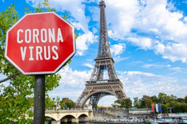 Corona virüsü Paris, Fransa 'daki Eyfel Kulesi ile imzalandı. Fransa 'da salgın hakkında uyarı. Coronavirus hastalığı. COVID-2019 uyarı işareti