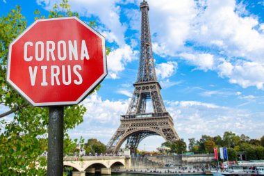 Corona virus sign with Eiffel tower in Paris, France. Warning about pandemic in France. Coronavirus disease. COVID-2019 alert sign clipart