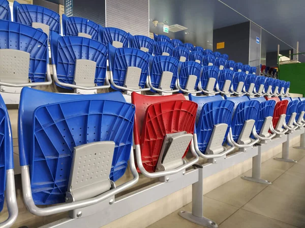 Empty stadium seats. Colorful stadium seats