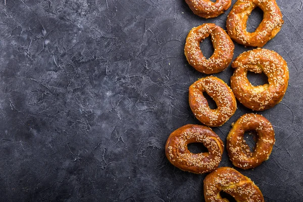 Bagel sesame golden bake color, soft inside, crispy outside. top — Stock Photo, Image