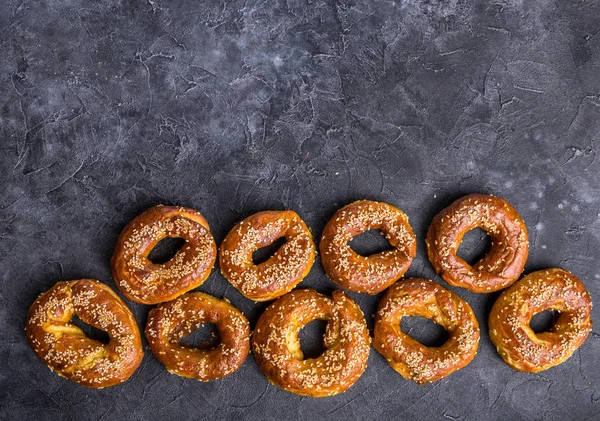 Bagel sesame golden bake color, soft inside, crispy outside. top — Stock Photo, Image