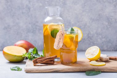 Healthy tea kombucha with lemon and cinnamon.