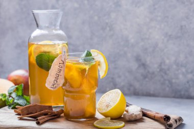 Healthy tea kombucha with lemon and cinnamon.