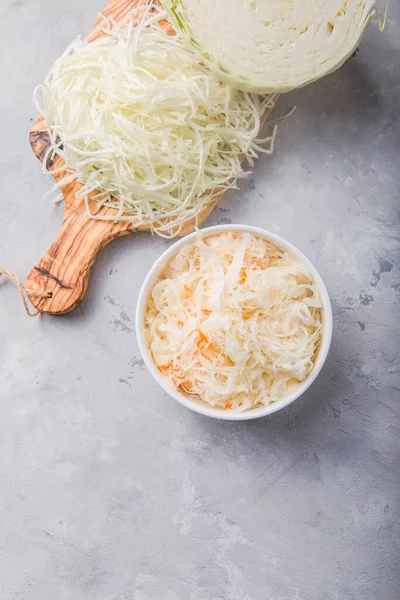 Homemade sauerkraut village fermented cabbage. Vegan salad rustic style  organic vegetable  great for good health. Traditional russian winter meal. Probiotics food concept.