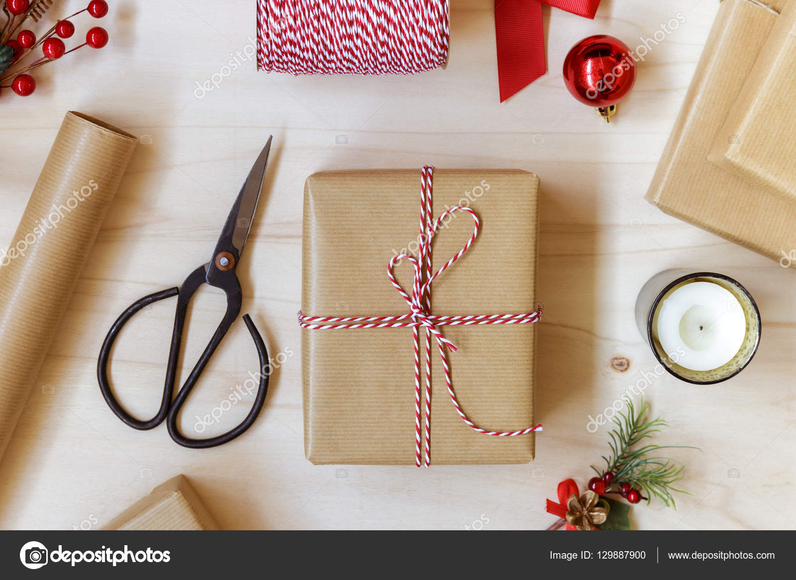 Christmas gift with scissors and ribbons hi-res stock photography