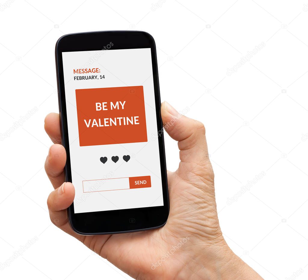Hand holding smart phone with valentine's day concept on screen