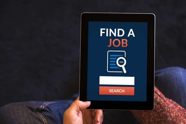 Hands holding tablet with find a job concept on screen — Stock Photo, Image