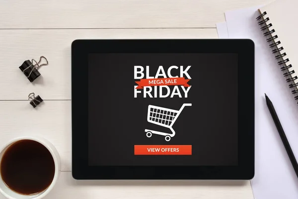 Black Friday concept on tablet screen with office objects