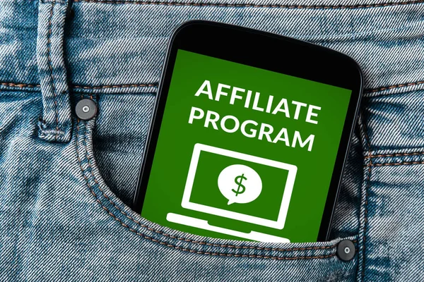 Affiliate program concept on smartphone screen in jeans pocket