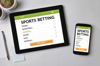 Kavram tablet ve smartphone ekranda bahis spor