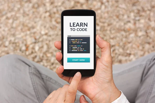 Learn to code concept on smartphone screen