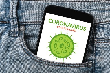 Coronavirus, covid-19, kot pantolon cebinde akıllı telefon ekranında sosyal mesafeli konsept. Evde kal. Hayat kurtar.
